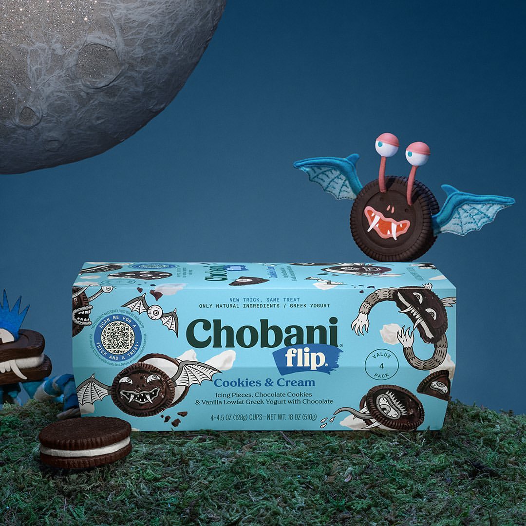 Chobani Flip Cookies & Cream yogurt product with a cookie monster decoration and a mock-up moon in a studio product shot.