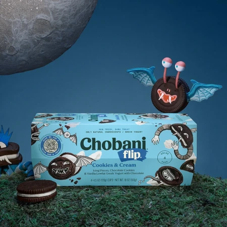 Chobani Flip Cookies & Cream yogurt product with a cookie monster decoration and a mock-up moon in a studio product shot.