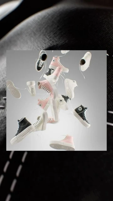 Floating collection of Converse Chuck Taylor All Star sneakers in white, pink, and black against a gradient gray background.
