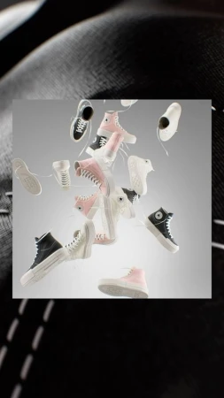 Floating collection of Converse Chuck Taylor All Star sneakers in white, pink, and black against a gradient gray background.