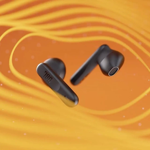 Close-up product shot of black JBL wireless earbuds with an orange background and abstract lighting effect for visual interest.