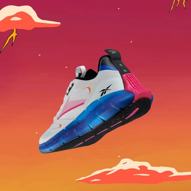 Studio shot of a white Reebok sneaker with blue and pink accents, hovering in the air against an illustrated orange and red background.