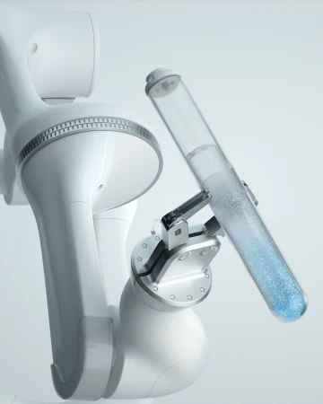 A white robotic arm holds a clear test tube filled with blue liquid in a sterile, brightly lit laboratory setting, emphasizing precision and technology.