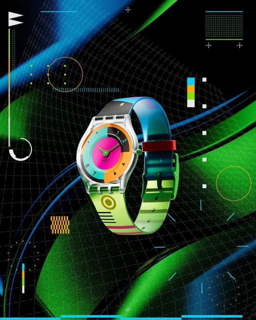 Swatch watch with multi-colored face and transparent band on a black background with blue and green abstract designs and geometric shapes.