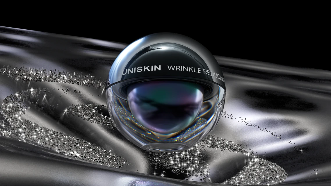 A clear jar of UNISKIN wrinkle reducing cream on a reflective black surface with shimmering particles, set against a dark background.
