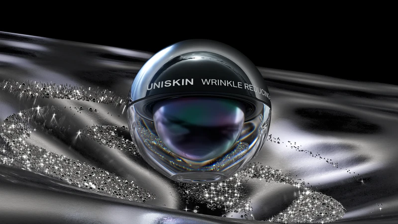 A clear jar of UNISKIN wrinkle reducing cream on a reflective black surface with shimmering particles, set against a dark background.