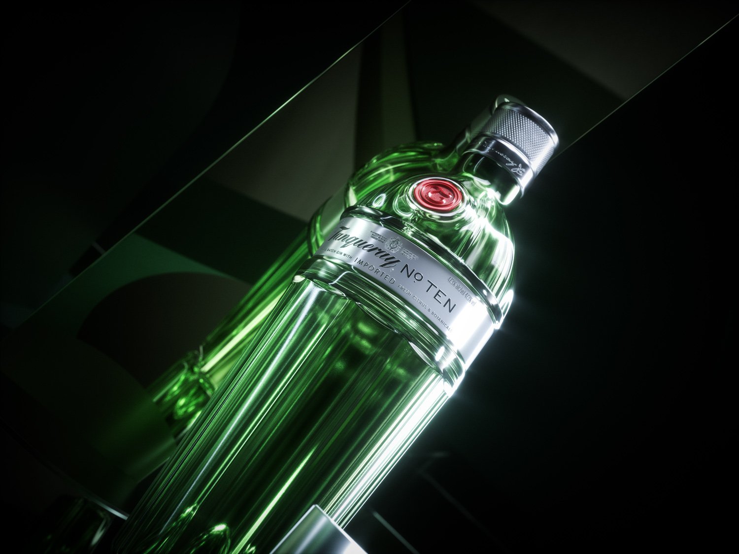 Angled studio shot of a faceted Tanqueray No. TEN gin bottle on a reflective surface against a dark background with green highlights.