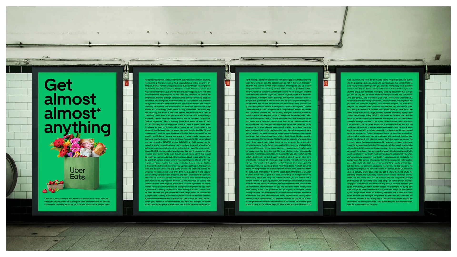 Uber Eats advertising poster inside a subway station featuring food items and the company logo on a lime-green background.