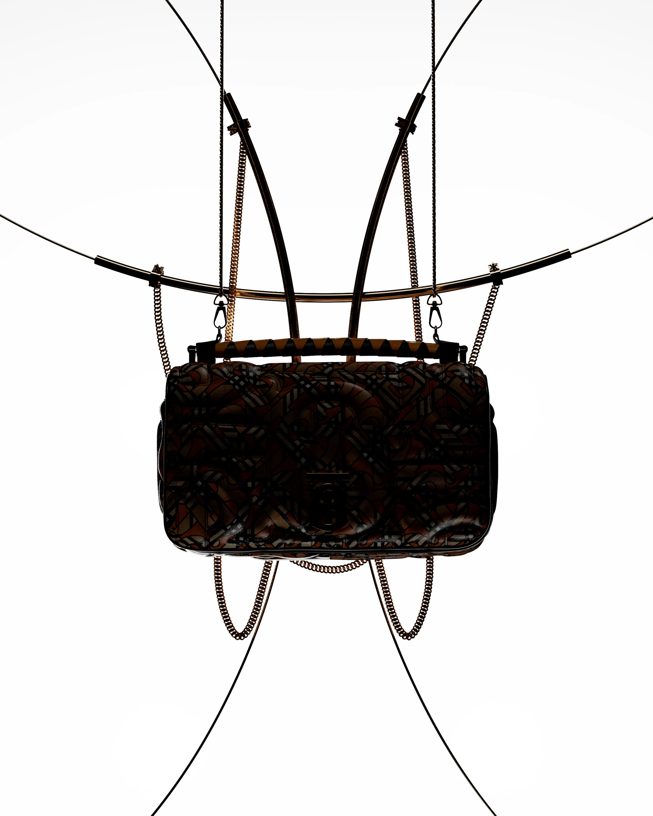 Quilted dark brown shoulder bag with chain straps hanging on a wire display against a white background in a product or studio shot.
