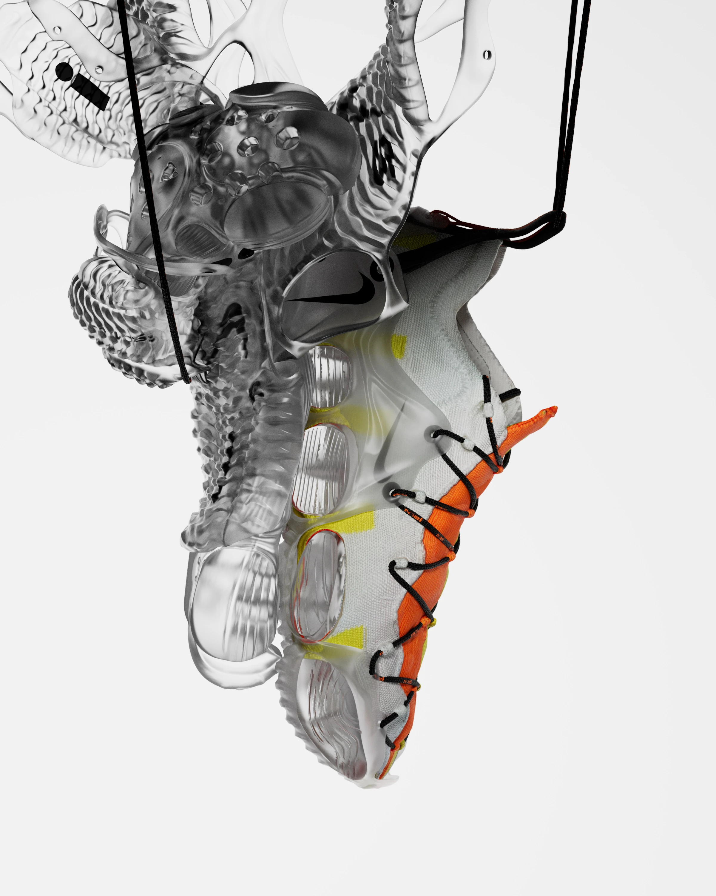 Product shot of a Nike shoe, featuring orange and white accents, suspended by black cords next to transparent abstract sculpture.