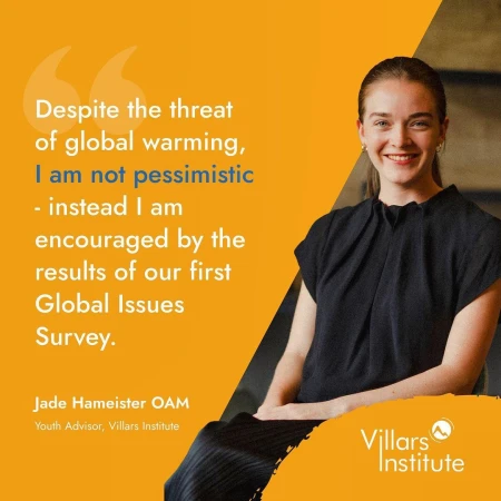 Smiling woman in black top posing against quote and the Villars Institute logo in a warm, inviting composition.