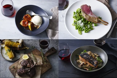Four-panel culinary food photography showcasing gourmet dishes including roasted rack of lamb, glazed figs, grilled corn, and salmon with noodles.