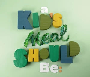 3D rendered typographic composition spelling out a kids meal should be with wooden block letters and fresh kale leaves against a green background