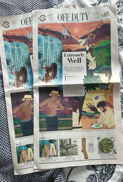 Two newspaper pages featuring illustrated scenes with figures, landscapes, and lifestyle elements on a patterned fabric background.