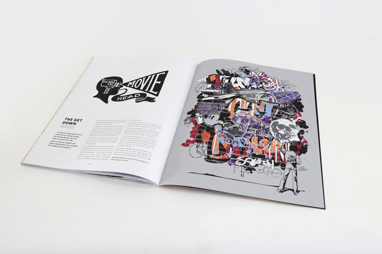 Open magazine spread featuring black-and-white graphic design and article on one page, and an abstract skull-shaped art piece on the other.