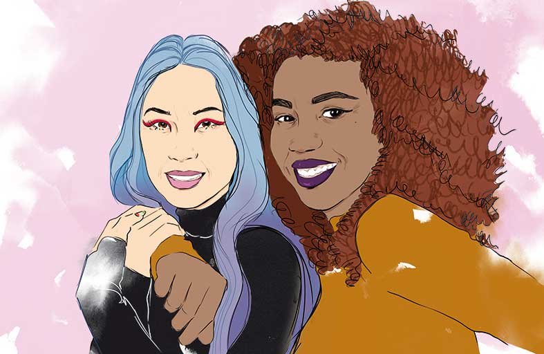 Illustration of two smiling adult females with blue and brown hair, wearing black and yellow tops on a pink and white background.