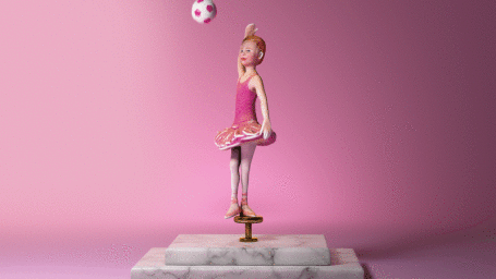 Ceramic figurine of a young ballerina balancing on a marble pedestal with a pink and white ball above