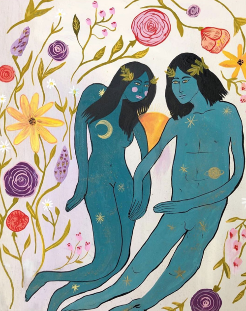 Illustration of an androgynous blue-skinned couple adorned with stars, moons, and leaves, surrounded by flowers, on a light background.