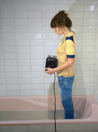 Painting of a woman in jeans and a yellow shirt standing in a pink bathtub filled with water while holding a black electrical device.