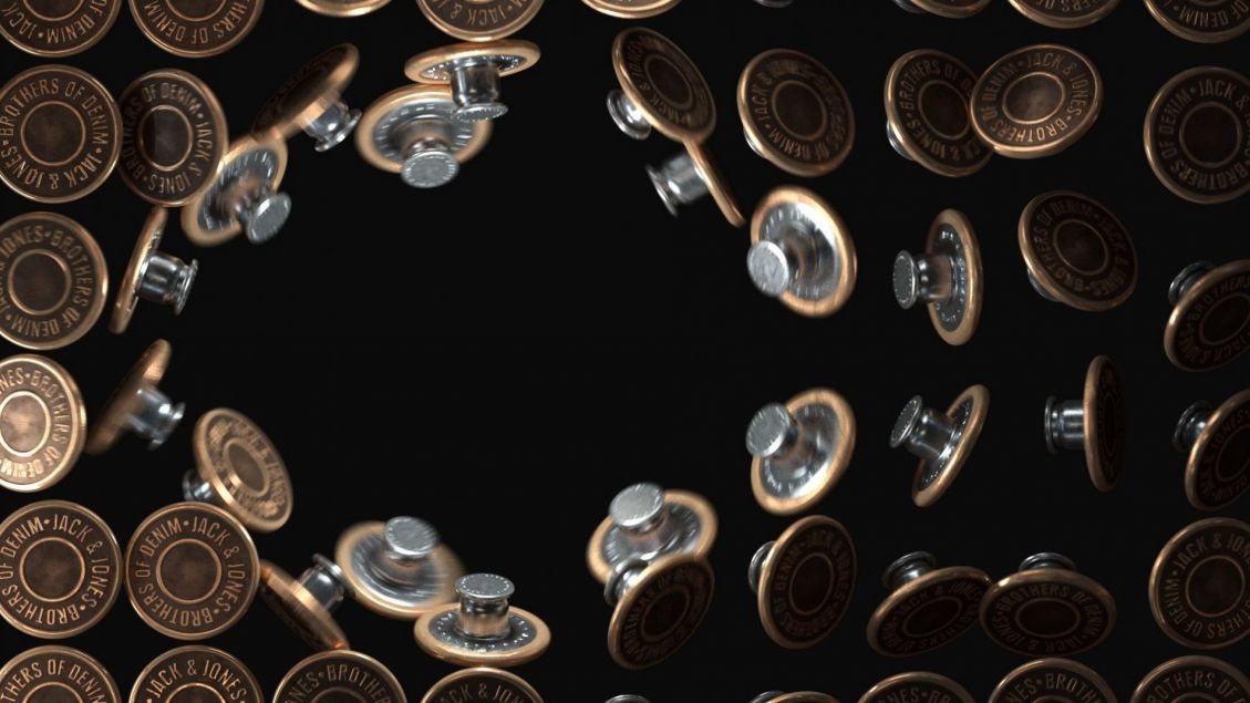 Close-up of multiple denim jean buttons with text and branding, arranged in a circular pattern against a solid black background.