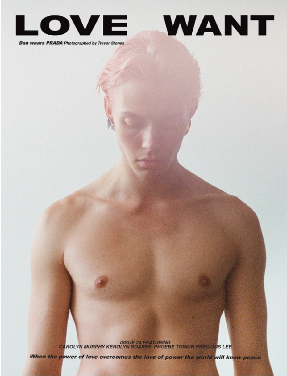 Shirtless male model with pink-toned hair posing against a plain light background for a Love Want magazine cover feature