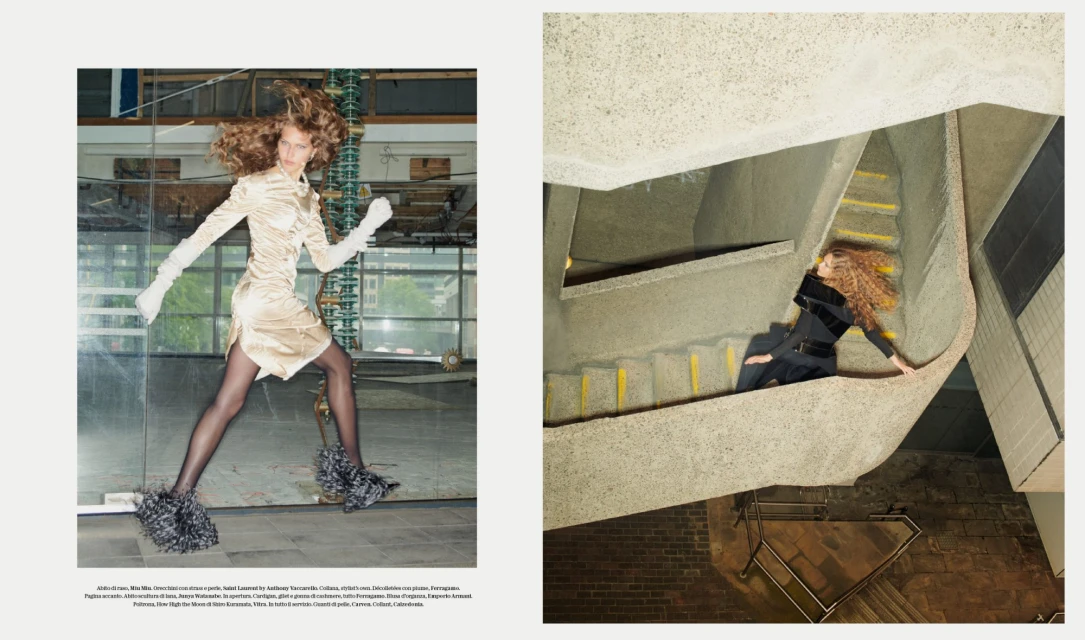 Fashion editorial shot of a woman in a short dress and furry boots striking a pose; another woman in black poses on concrete stairs.