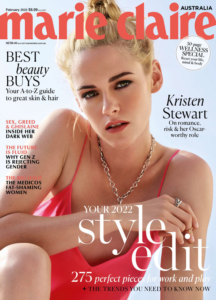 Marie Claire Australia magazine cover featuring Kristen Stewart wearing a pink top and silver necklace with a light blue background.
