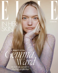 Gemma Ward on magazine cover wearing sparkling embellished top with hand touching cheek against pale background.