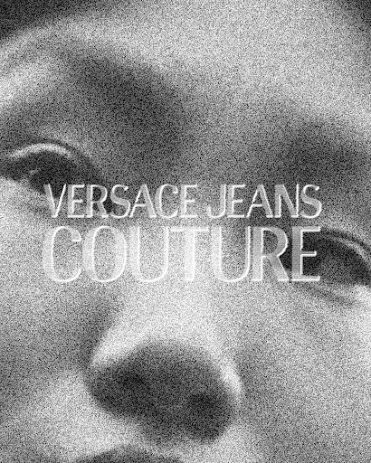 Close-up black and white fashion ad featuring a partially visible face with 'VERSACE JEANS COUTURE' text overlay in white and grey.