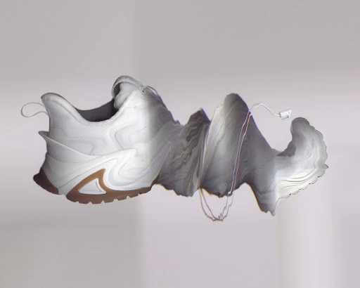 White athletic shoe with a distorted, marbled texture effect over a light background, showcasing a blend of footwear and art.