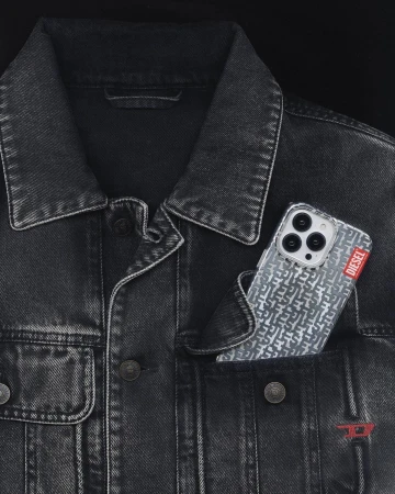 Close-up of a black denim jacket with a Diesel-branded phone case in the pocket, featuring a pattern of interlocking 'D' logos.