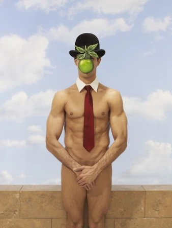 Surreal image of a shirtless man wearing a bowler hat with an apple covering his face, posing in front of a cloudy sky and a low wall.