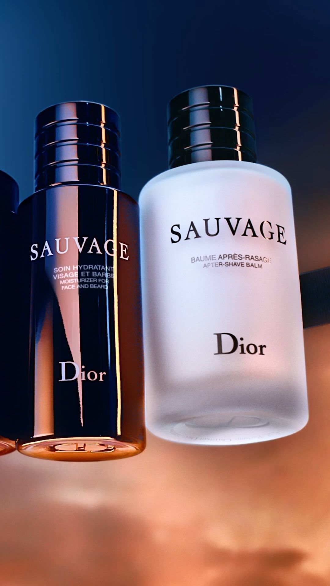 Close-up product shot of two Dior Sauvage bottles in dark bronze and frosty white with branding against a gradient blue background.