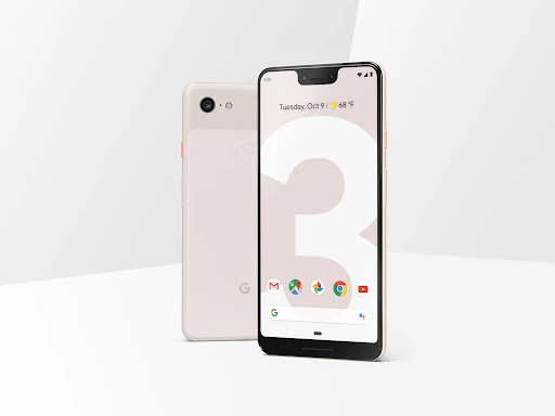 Two Google Pixel 3 smartphones in white. One is facing forward with its screen on, showing the home screen. Clean white background.