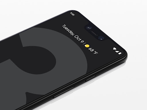 Close-up of a black smartphone showing the date Tuesday, October 9th at 9:00 AM on the screen against a white background.