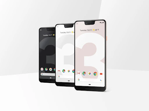 Three Google Pixel 3 smartphones are lined up against a bright white background showing app icons and operating system details.