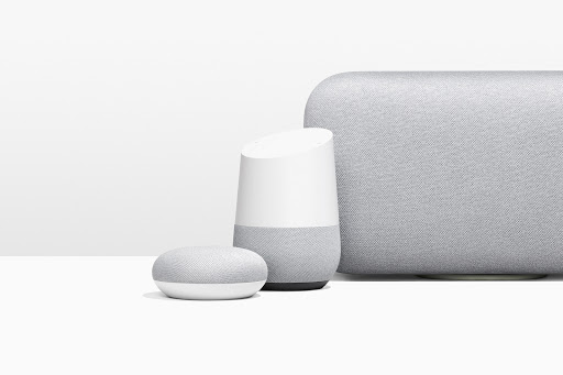 Three Google Nest smart home speakers in graduated sizes are displayed on a white surface against a plain white background.