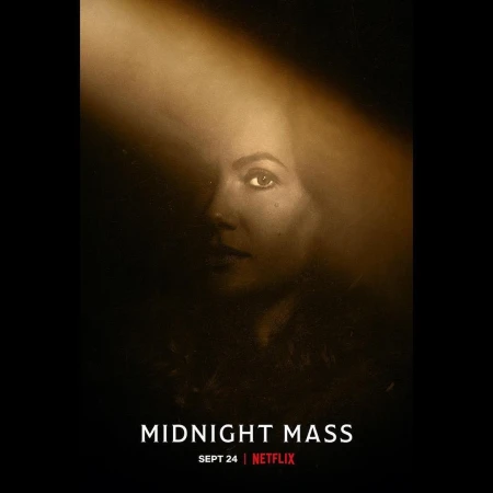 Movie poster of a woman's face in a beam of light against a dark background for 'Midnight Mass' movie on Netflix, Sept 24th.