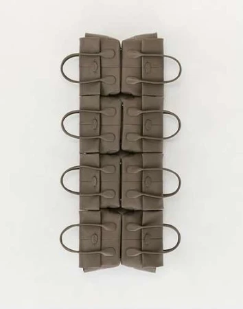 Eight grey leather handbags arranged symmetrically in two vertical columns against a white background