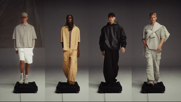 Four male fashion models showcase casual clothing: short-sleeved shirts, hoodies, shorts, and trousers, walking on platforms in a studio setting.