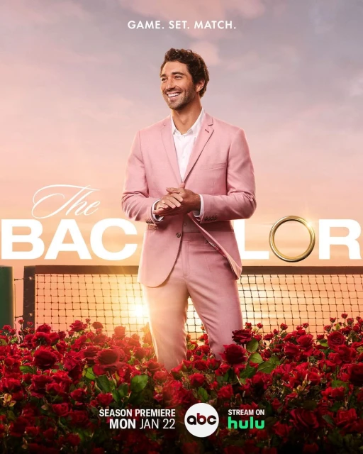 Man in a pink suit smiles against a sunset backdrop with roses and tennis net for "The Bachelor" TV show promotional poster.