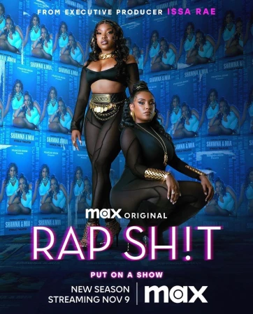 Two women pose in front of a show poster for MAX's Rap Sh!t, new season streaming November 9. The poster features the show's title.
