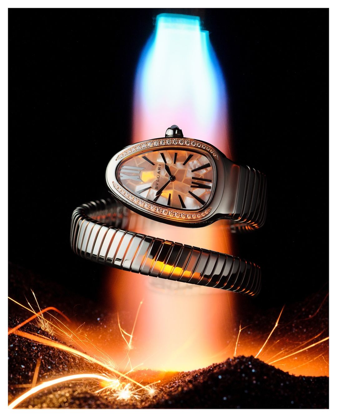 Close-up of an expensive women's wristwatch with bracelet, presented against a dramatic black background with glowing light streaks.