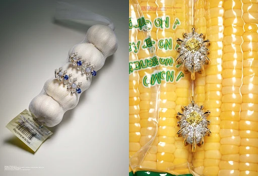 Fine jewelry earrings displayed on garlic in mesh and corn in plastic bag. Unique still life product advertisement shot in studio.