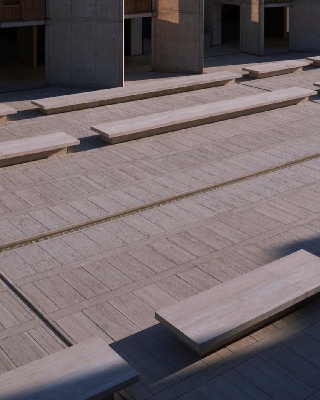 Architectural outdoor space with concrete benches and floor tiles, creating a minimalist and geometric design, showcasing modern architecture.