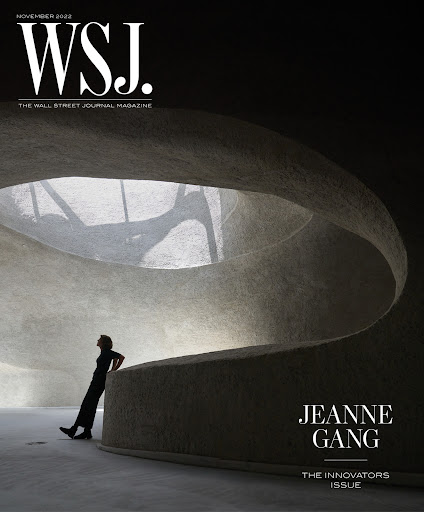 Wall Street Journal magazine cover featuring a silhouette of a woman standing in a modern architectural space with curved walls and a skylight.