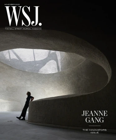 Wall Street Journal magazine cover featuring a silhouette of a woman standing in a modern architectural space with curved walls and a skylight.