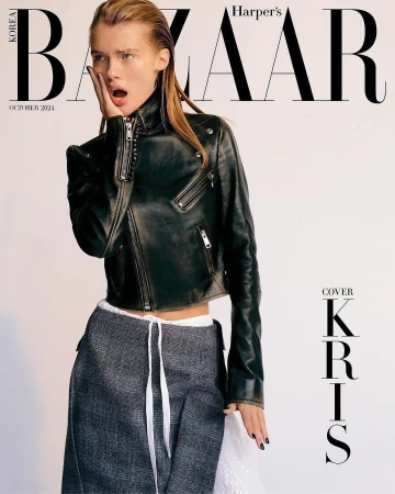 Model in black leather jacket and grey skirt with white drawstrings against a white background for Harper's Bazaar magazine cover.