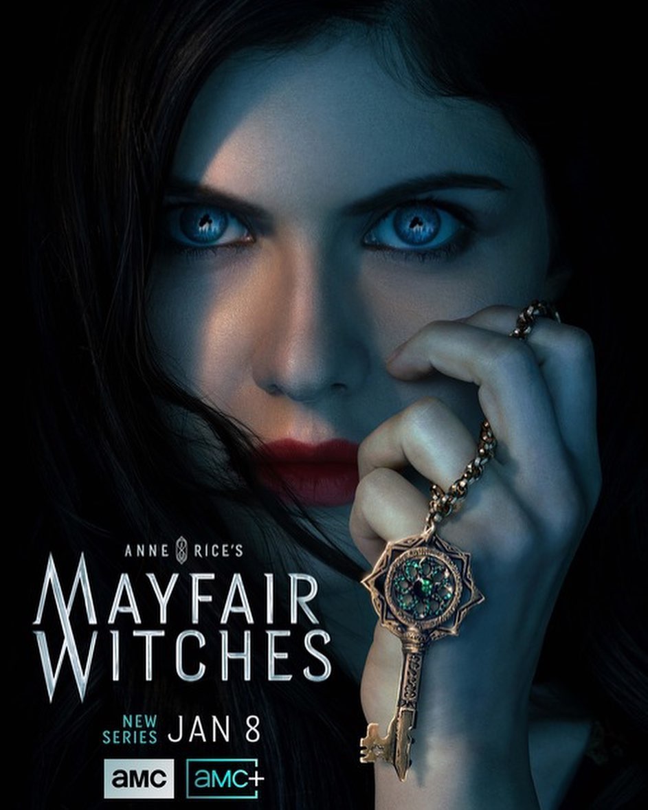 Close-up of Alexandra Daddario with bright blue eyes and dark hair, holding a decorative key in a promotional image for Mayfair Witches.