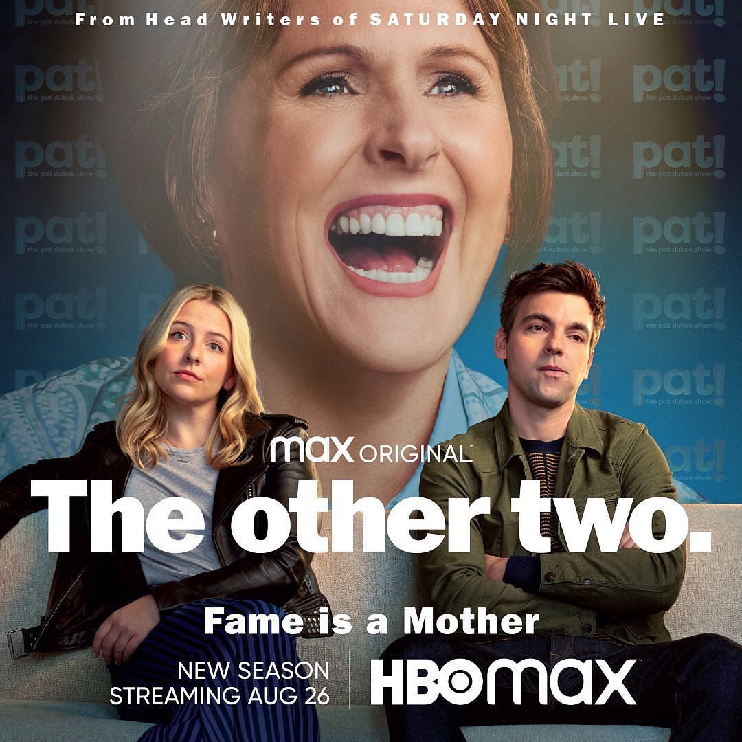 Movie poster for 'The Other Two' features three actors: two in the foreground seated on a couch, and one large in the background.